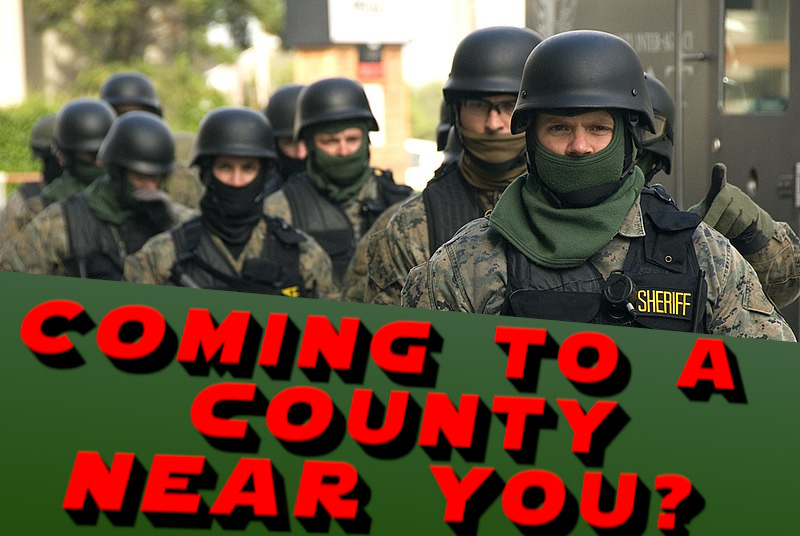 Picture of SWAT Team with the words "Coming to a County near you?" over a green background
